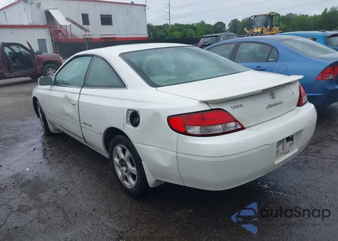1999 Toyota Camry Solara Sle z USA, uszkodzony, nr VIN 2T1CF28P0XC118168